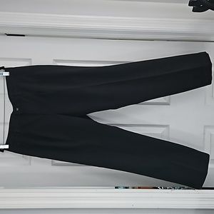VAN HEUSEN MEN'S CLASSIC FIT PANTS. SIZE 33X30. COLOR BLACK